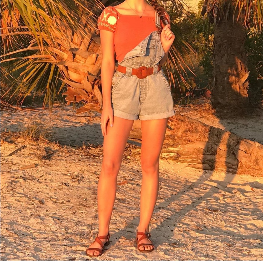 Medium wash romper overall
Size M